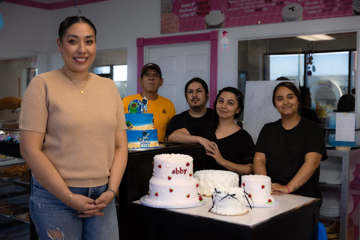 The Arcoiris bakery team with their cakes